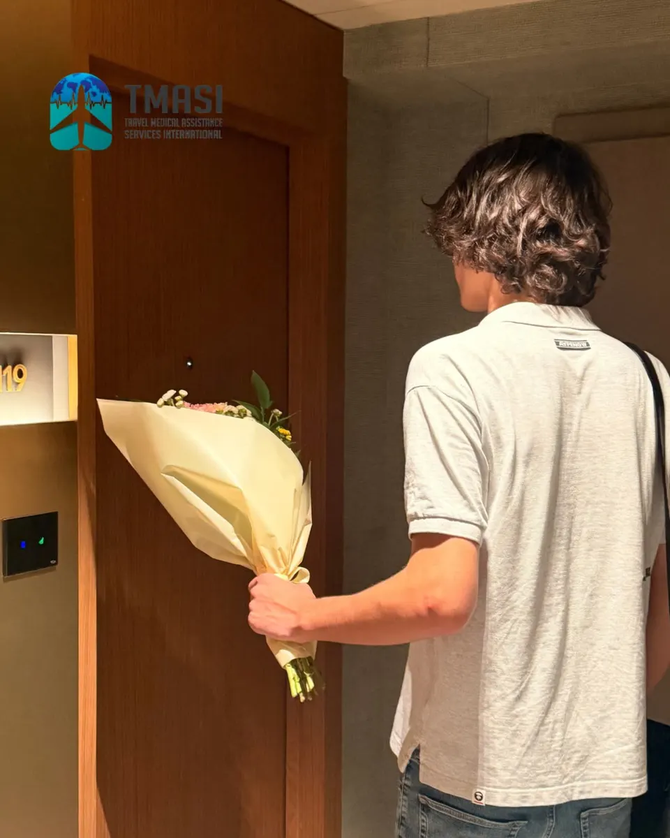 Flowers brought to a guest room door for a birthday